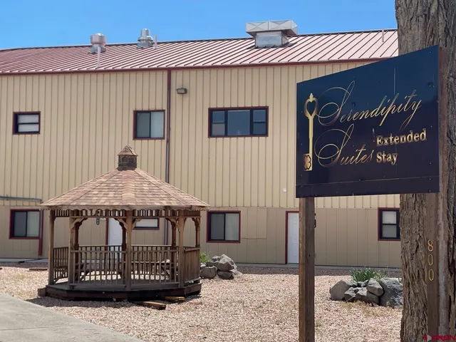 a view of a house with a roof deck