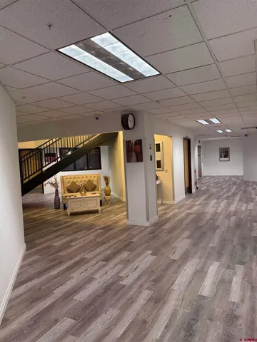 a view of a hallway with a large window