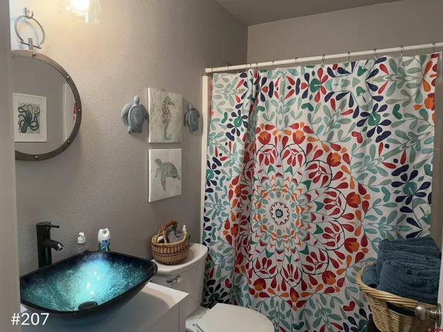 a view of a terrace with a ocean