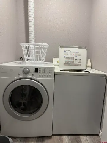 a utility room with dryer and washer
