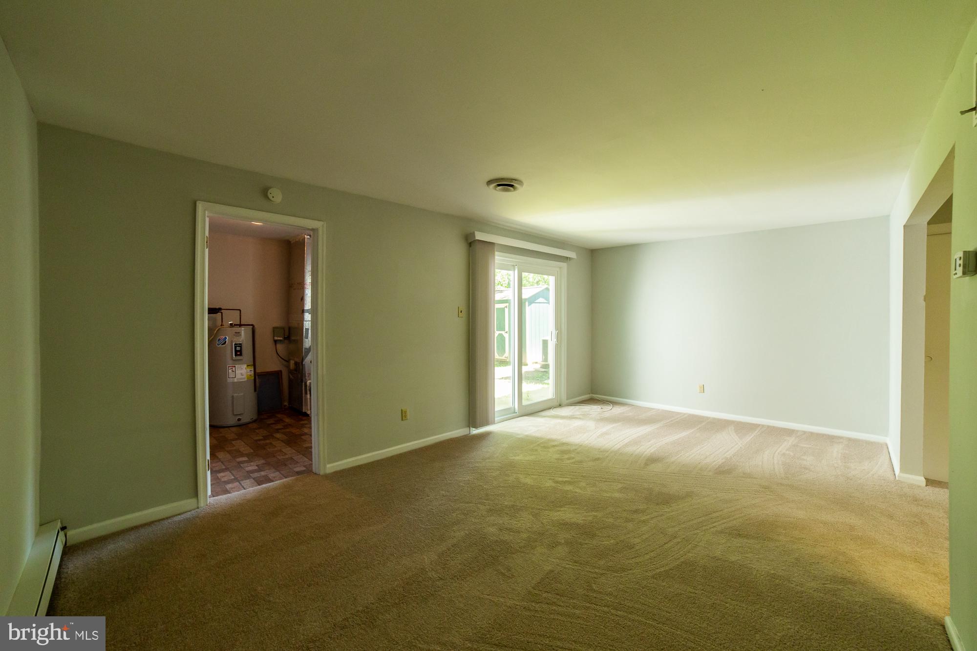 10 Stonegate Road Quakertown, PA 18951 - Photo 16 of 31 Family room to utility room