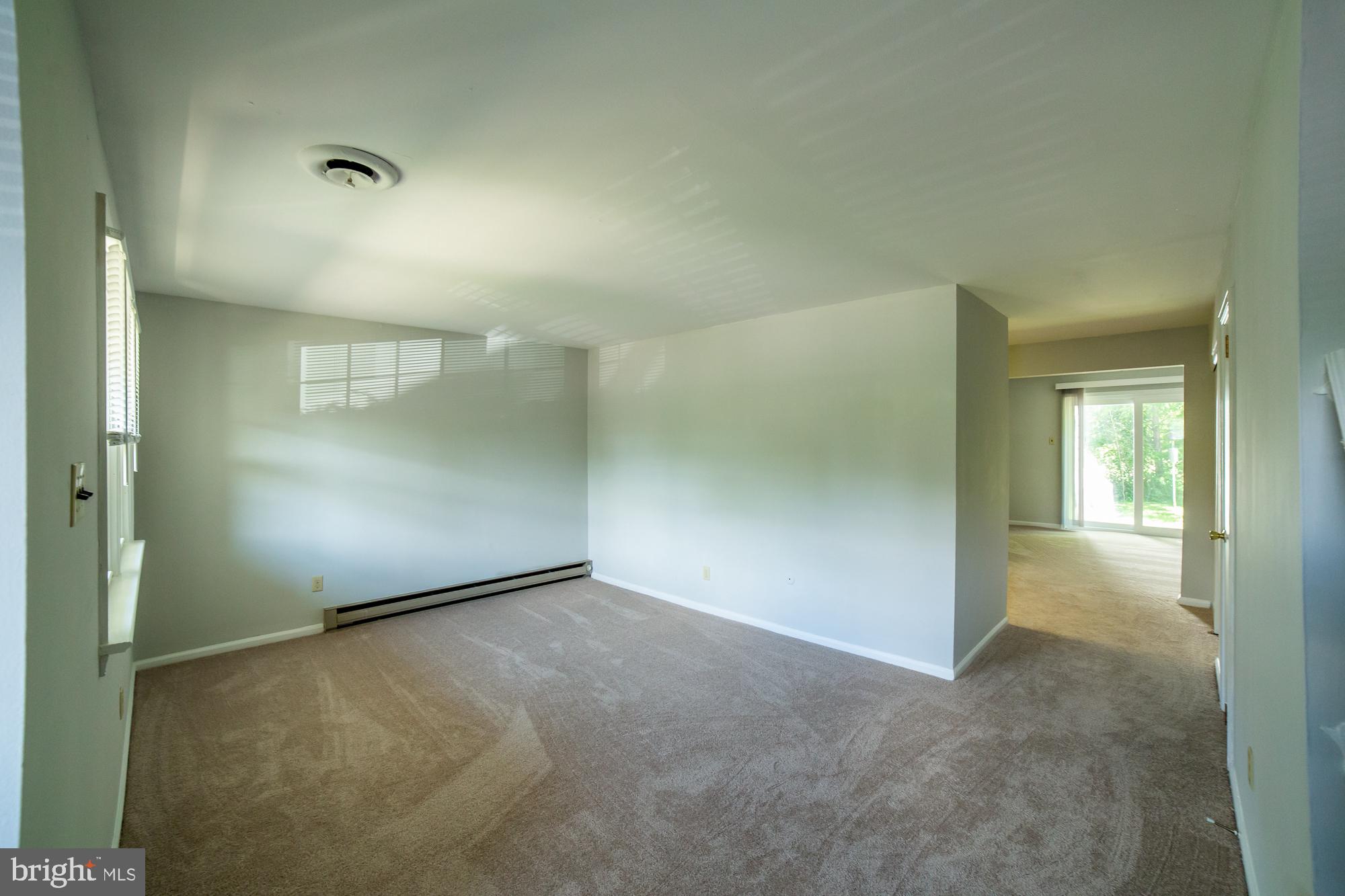 10 Stonegate Road Quakertown, PA 18951 - Photo 6 of 31 Living room to kitchen and family room