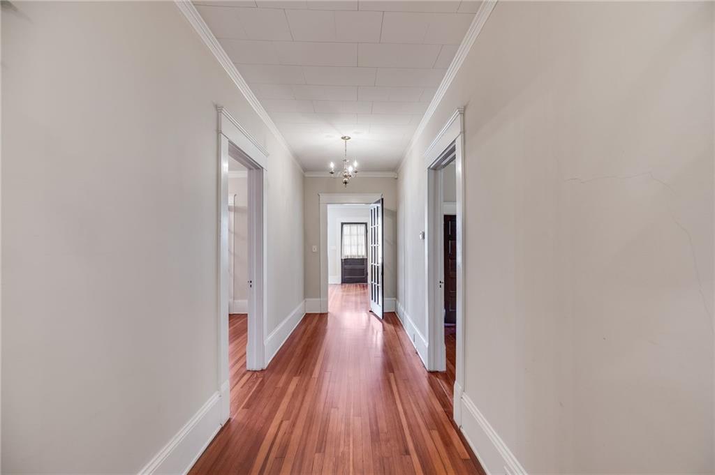427 East College Street Bowdon, GA 30108 - Photo 13 of 30 a view of a hallway with wooden floor
