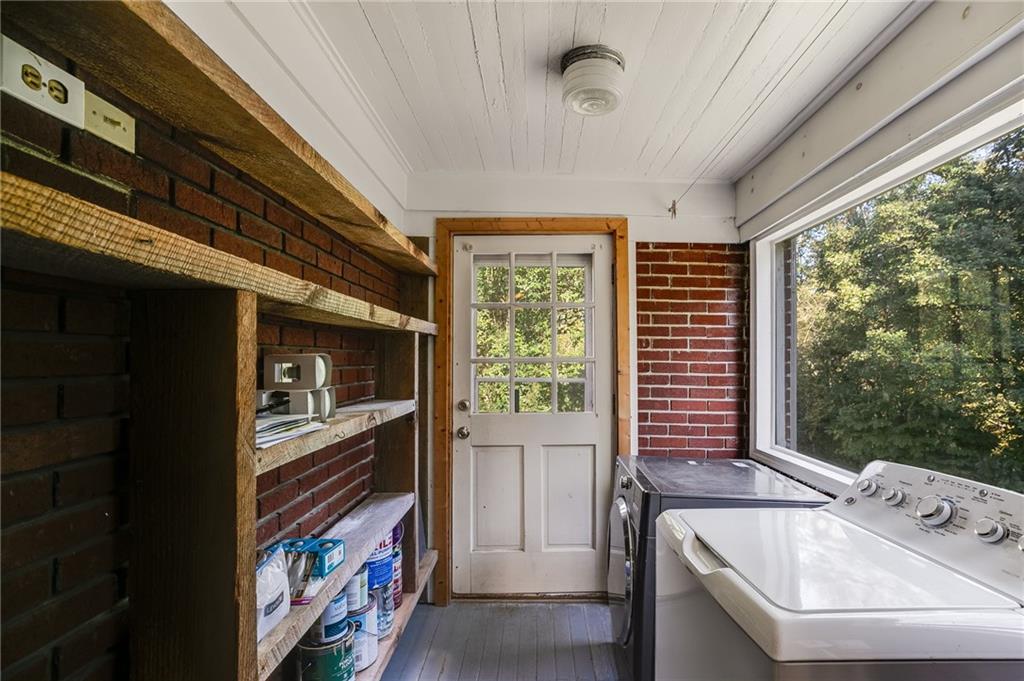 427 East College Street Bowdon, GA 30108 - Photo 18 of 30 a bathroom with a sink a bathtub and next to a window