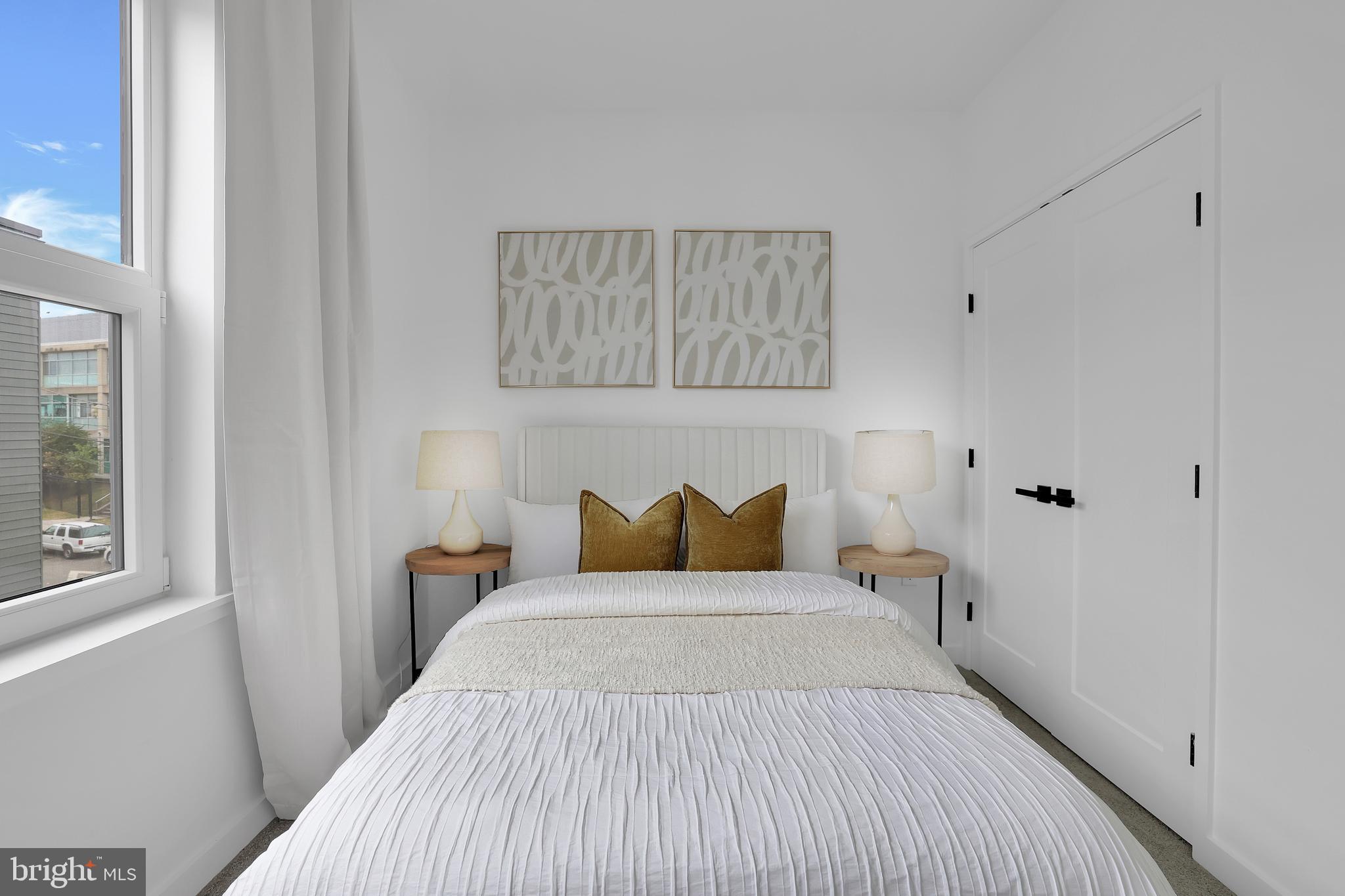 1028 Howard Road Southeast Washington, DC 20020 - Photo 14 of 35 a bedroom with a bed and window