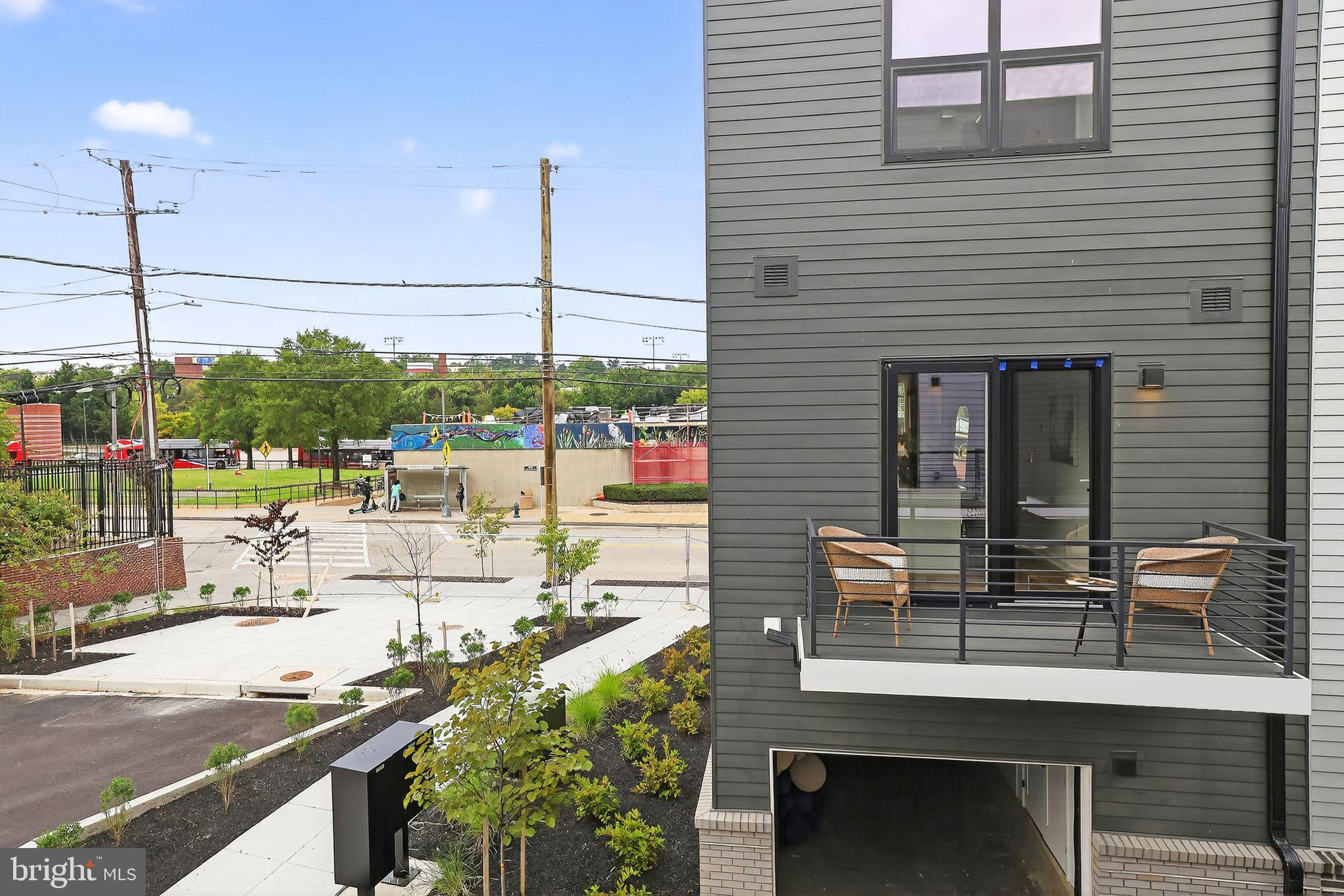 1028 Howard Road Southeast Washington, DC 20020 - Photo 20 of 35 a view of a patio with chairs and potted plants