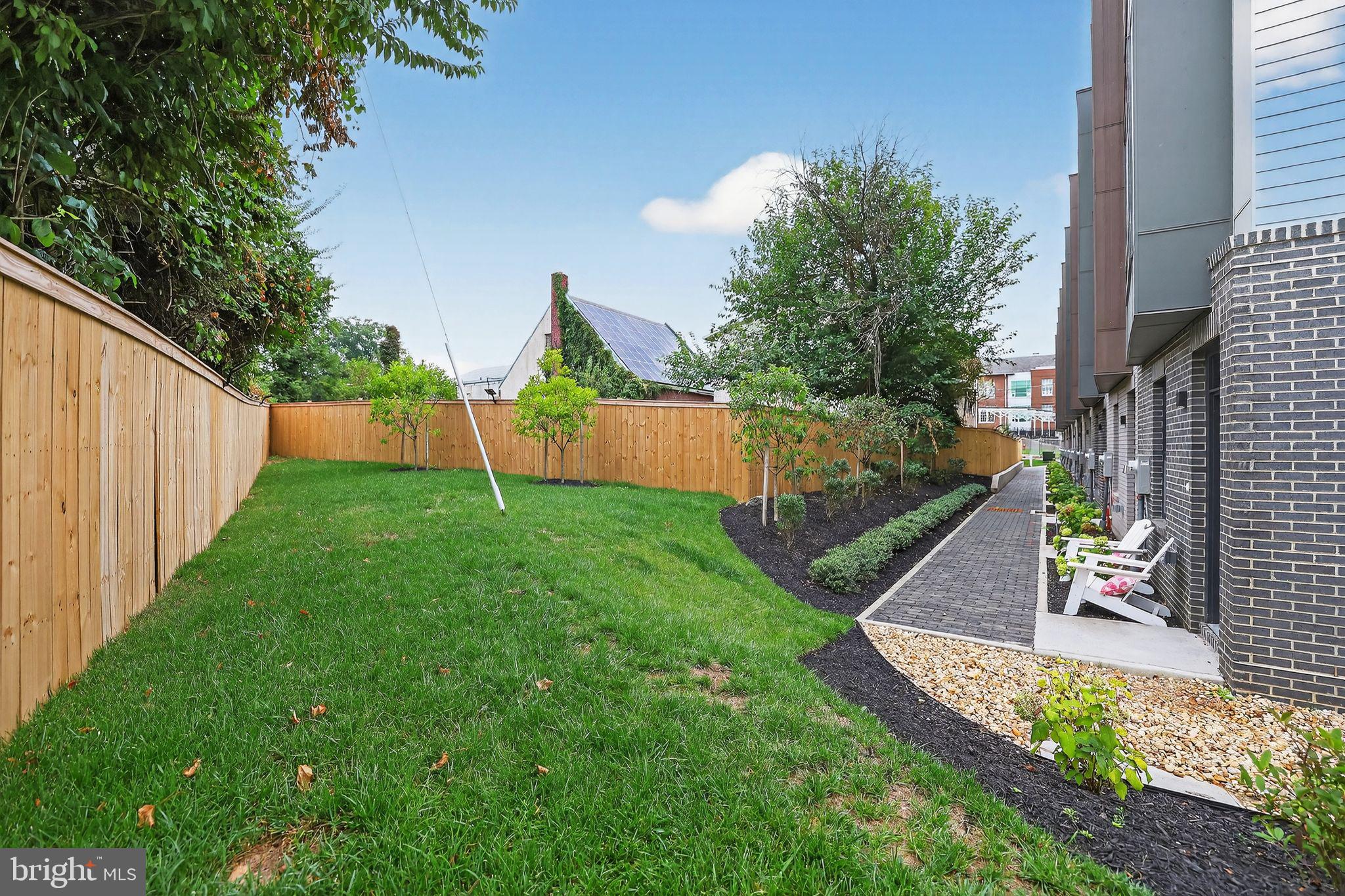 1028 Howard Road Southeast Washington, DC 20020 - Photo 24 of 35 a view of a house with a yard