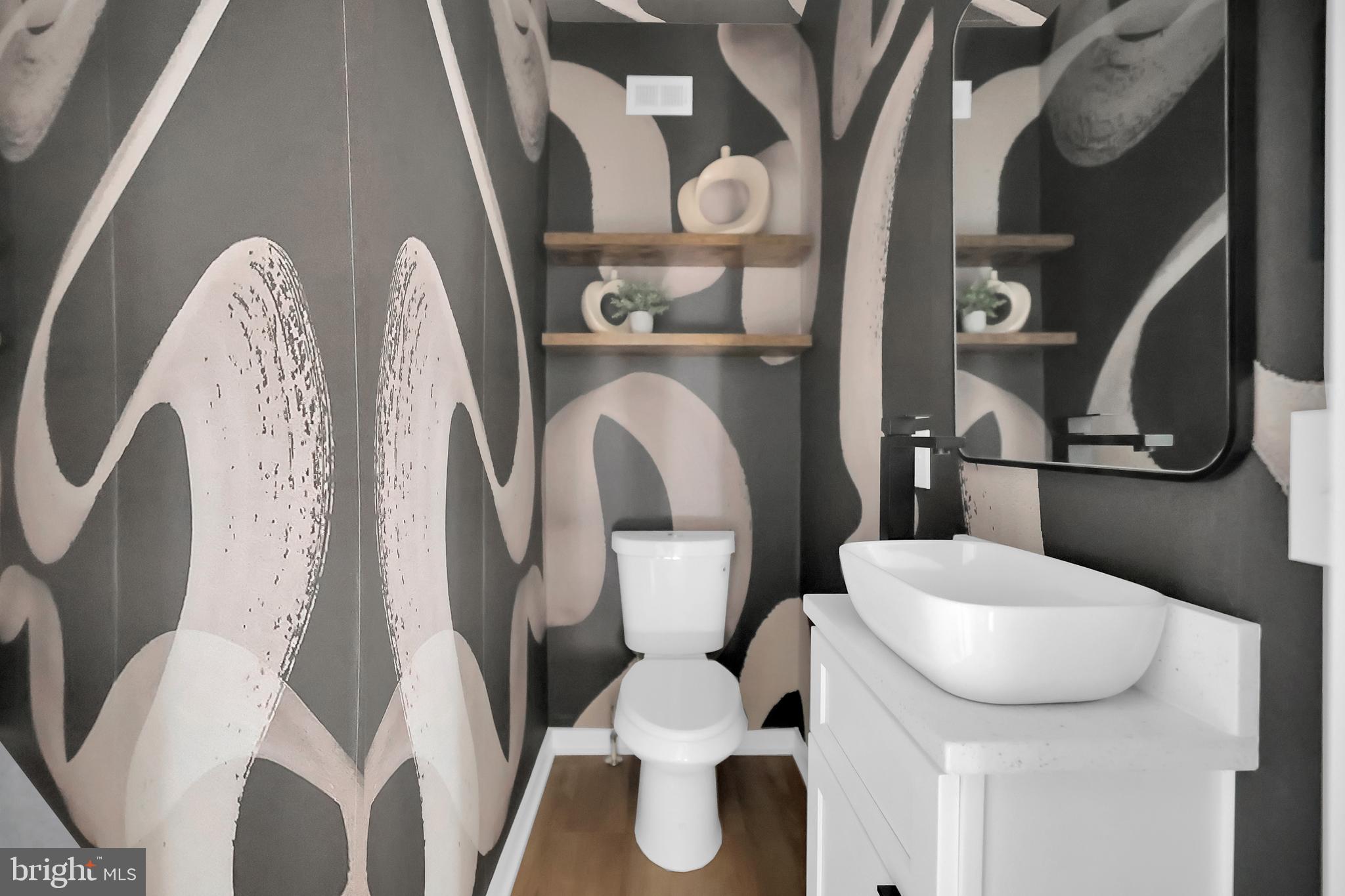 1028 Howard Road Southeast Washington, DC 20020 - Photo 10 of 35 a bathroom with a toilet and a mirror