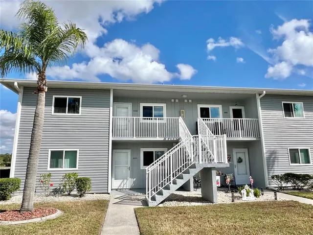 a front view of house with yard