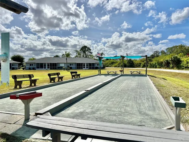swimming pool with outdoor seating
