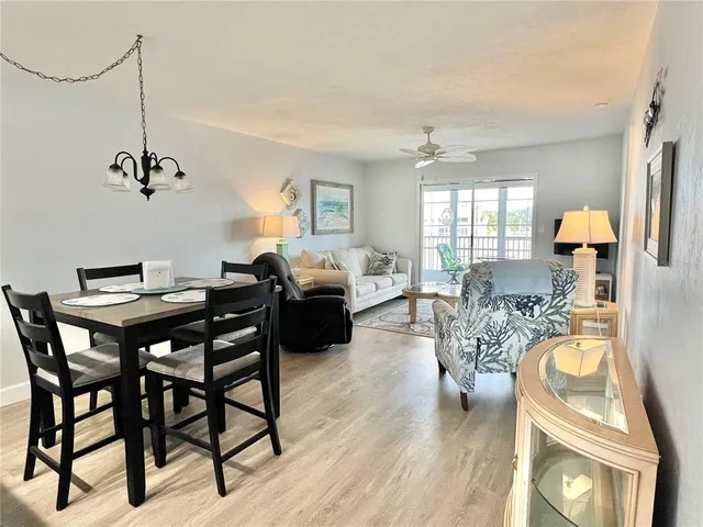 a view of a livingroom with furniture and window