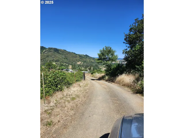 a view of a lake from a balcony