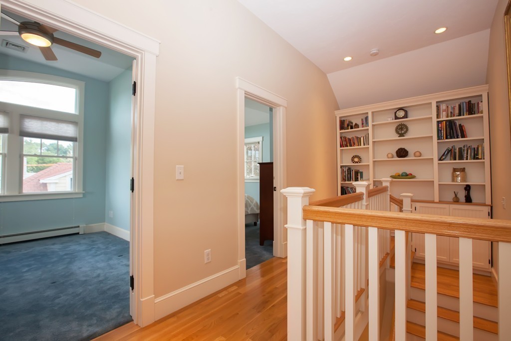 129 Fort Point Road Weymouth, MA 02191 - Photo 12 of 30 a view of wooden floor and windows in a room