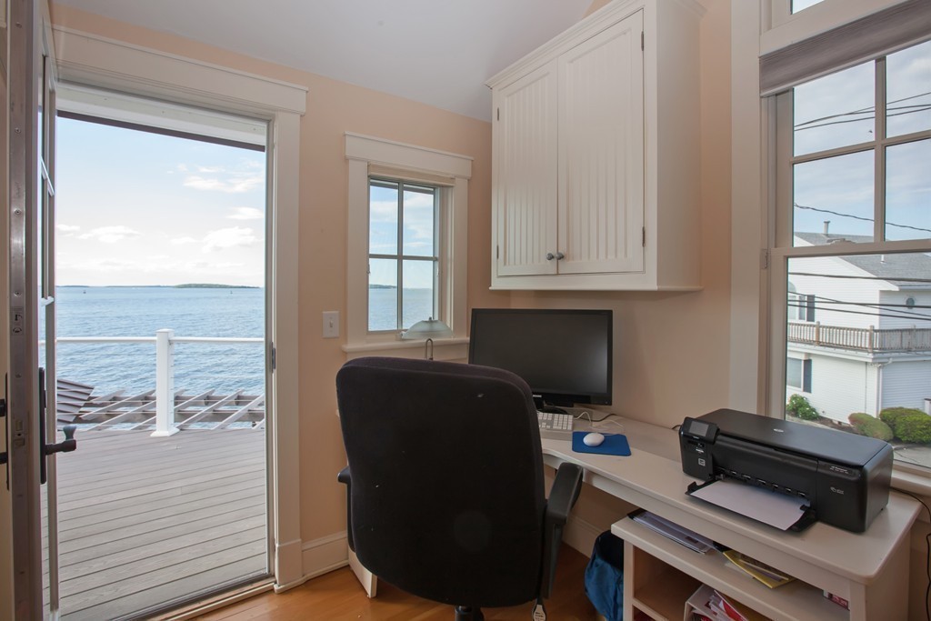 129 Fort Point Road Weymouth, MA 02191 - Photo 16 of 30 a room with furniture and a window