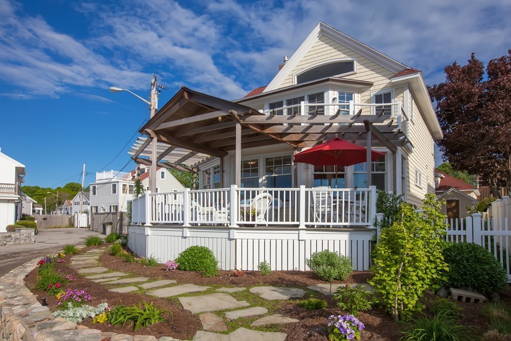 129 Fort Point Road Weymouth, MA 02191 - Photo 2 of 30 a front view of a house with garden