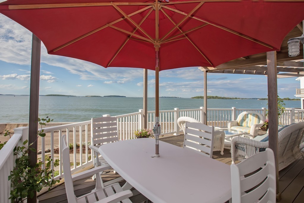 129 Fort Point Road Weymouth, MA 02191 - Photo 22 of 30 a table and chairs in the patio