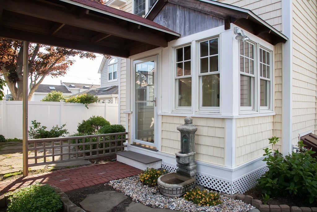 129 Fort Point Road Weymouth, MA 02191 - Photo 25 of 30 a view of a chair and table in the patio