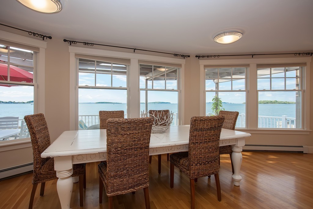 129 Fort Point Road Weymouth, MA 02191 - Photo 4 of 30 a view of a dining room with furniture window and wooden floor