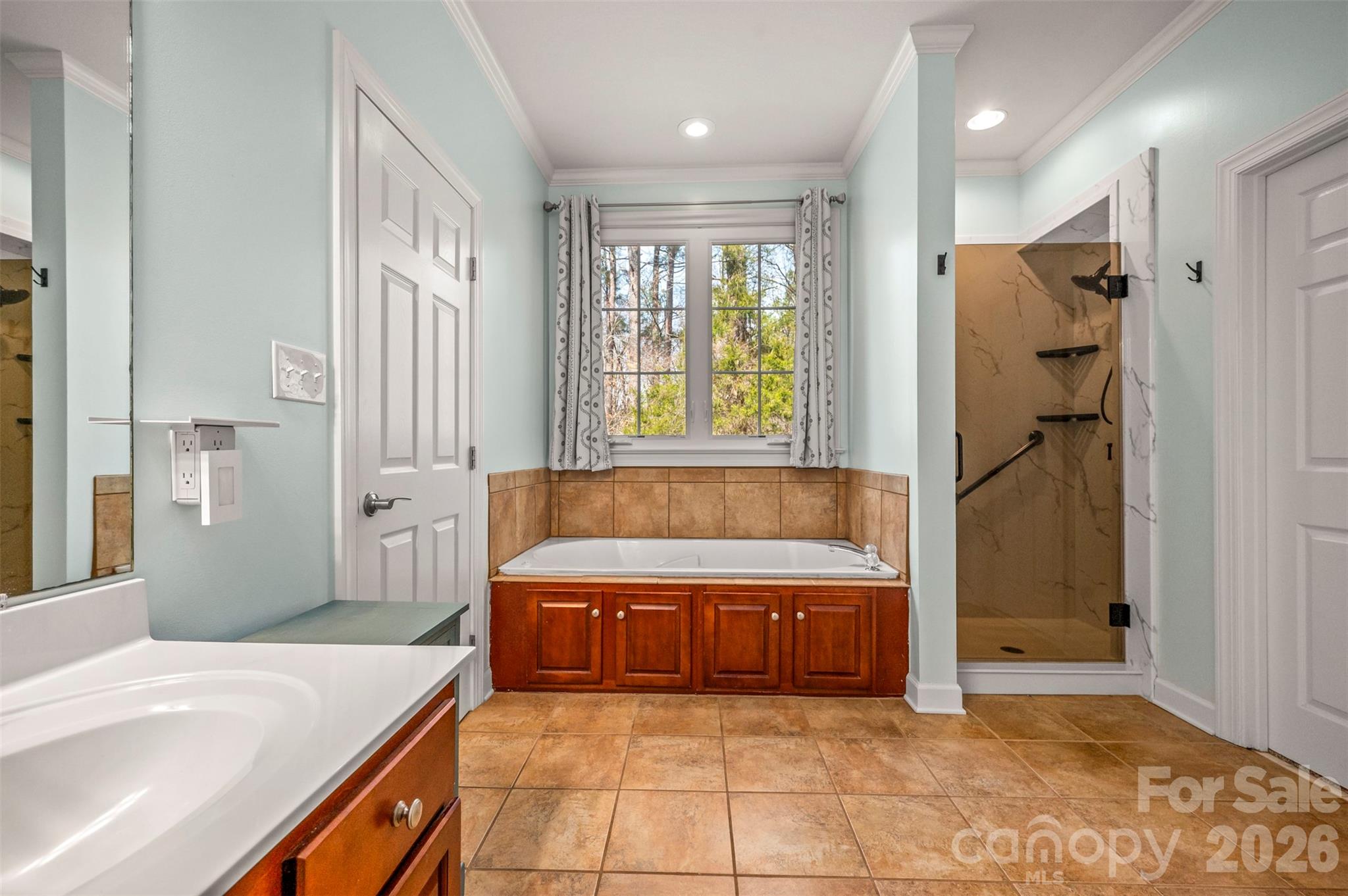 391 Chisholm Trail Rutherfordton, NC 28139 - Photo 20 of 39 a spacious bathroom with a tub sink and shower