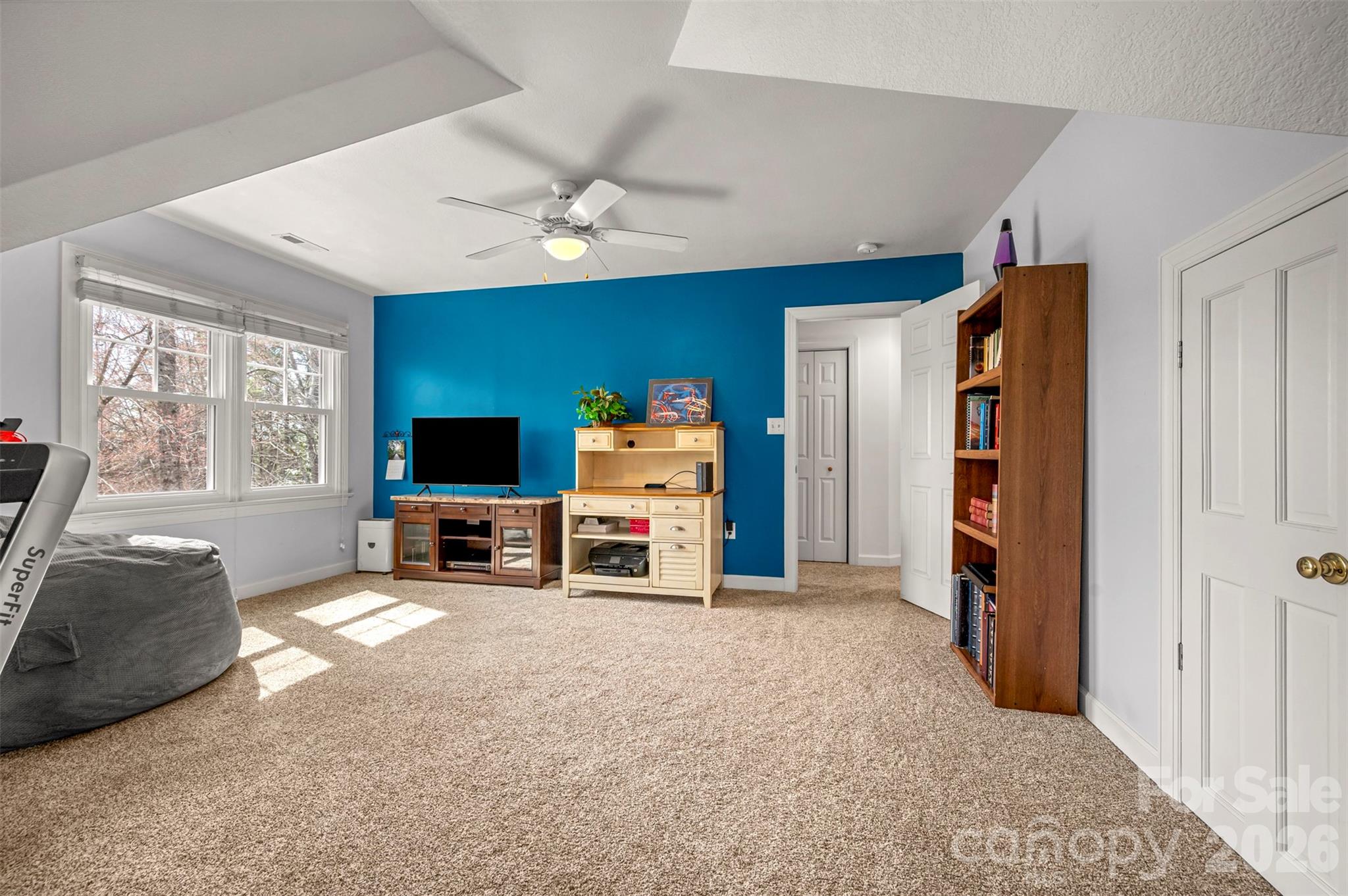 391 Chisholm Trail Rutherfordton, NC 28139 - Photo 29 of 39 a living room with furniture and a flat screen tv