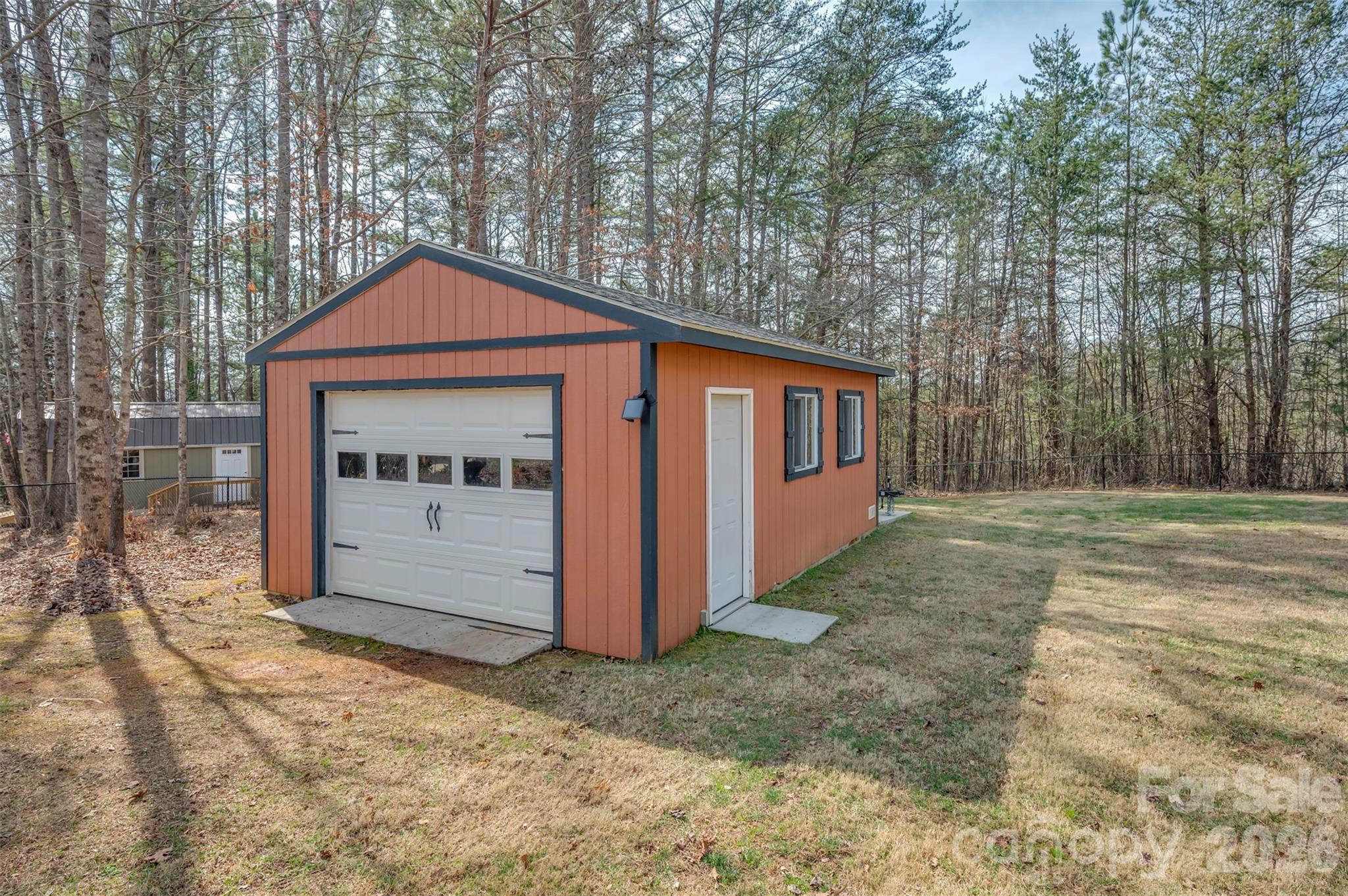 391 Chisholm Trail Rutherfordton, NC 28139 - Photo 30 of 39 a front view of a house with a yard