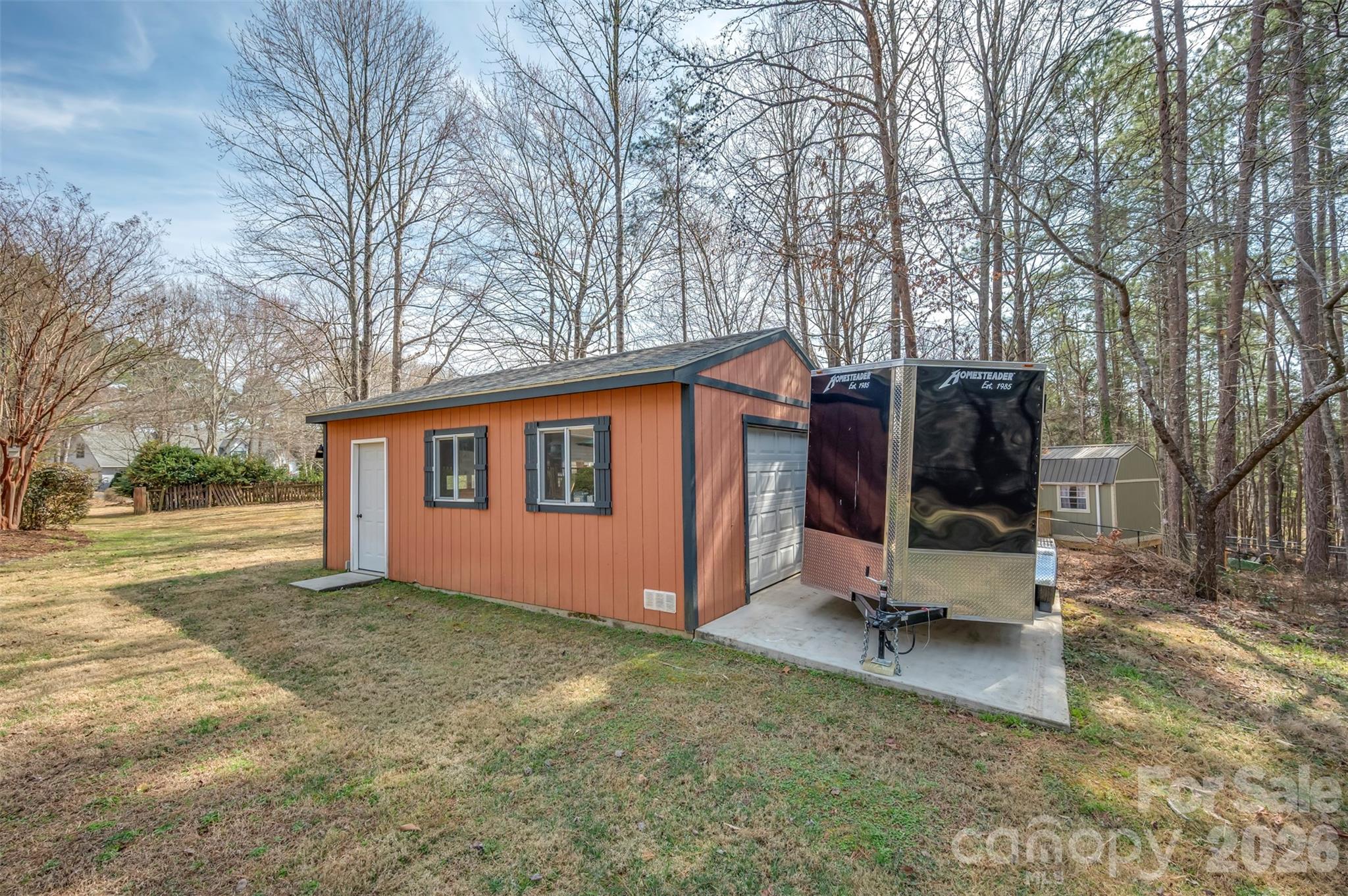 391 Chisholm Trail Rutherfordton, NC 28139 - Photo 33 of 39 a view of backyard with a garden and trees
