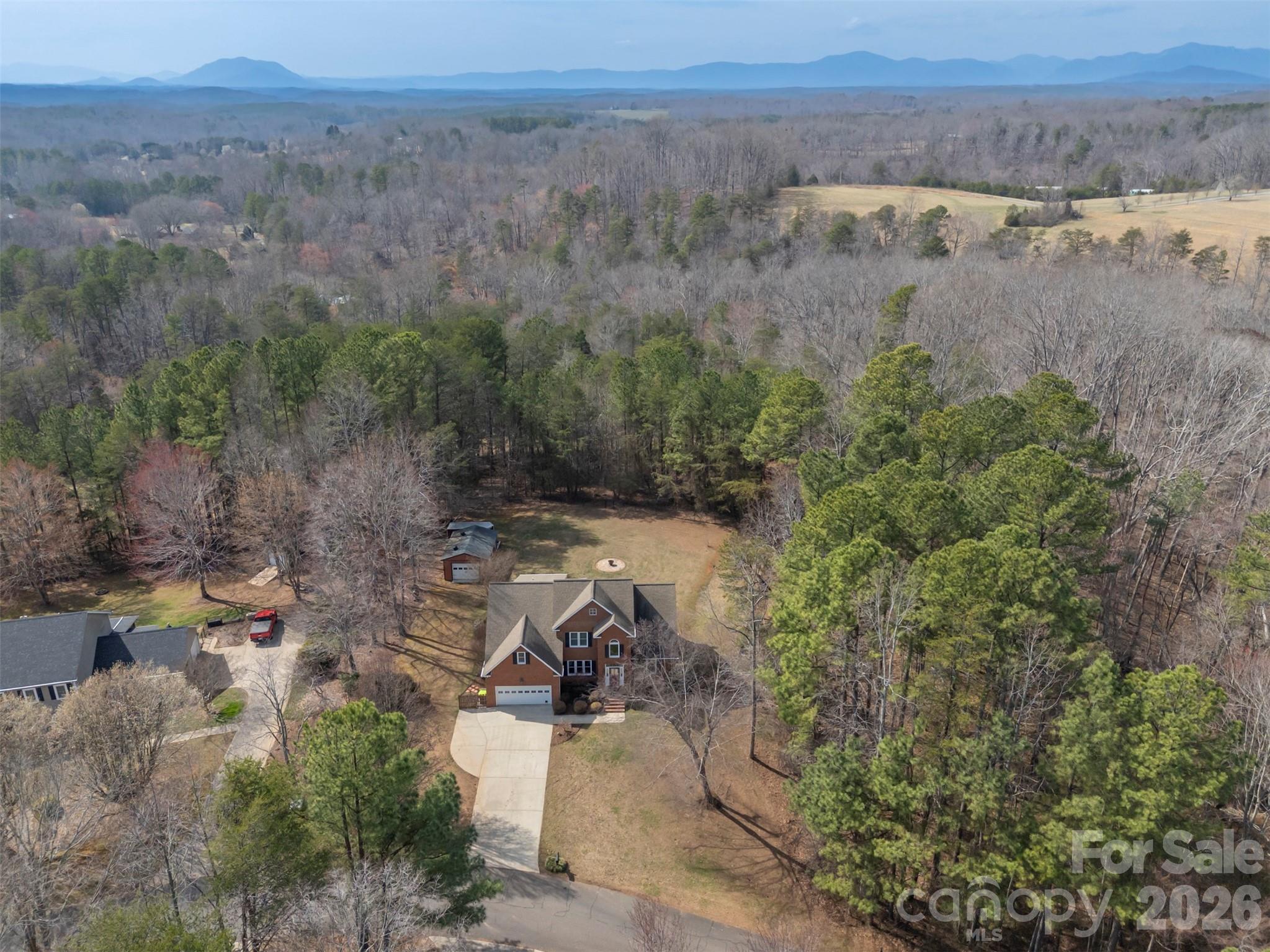 391 Chisholm Trail Rutherfordton, NC 28139 - Photo 38 of 39 an aerial view of a house with a yard