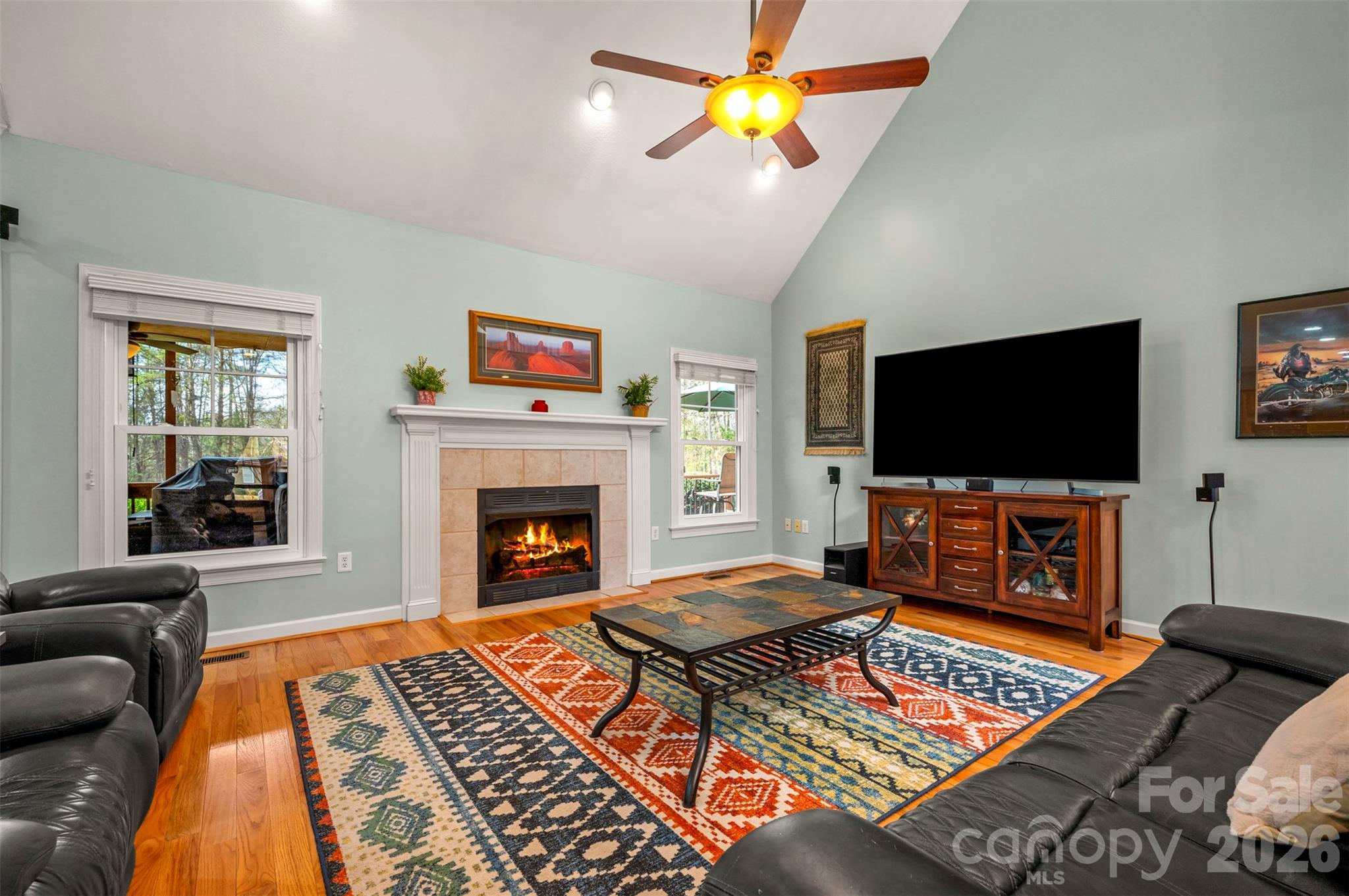 391 Chisholm Trail Rutherfordton, NC 28139 - Photo 8 of 39 a living room with furniture and a flat screen tv