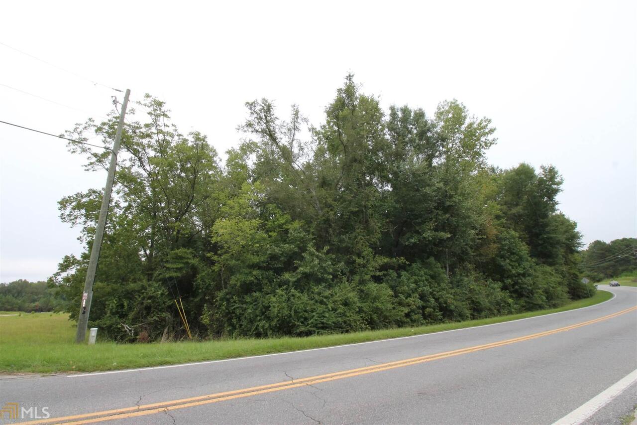 675 Dunlap Road Northeast Milledgeville, GA 31061 - Photo 1 of 7 a view of a yard
