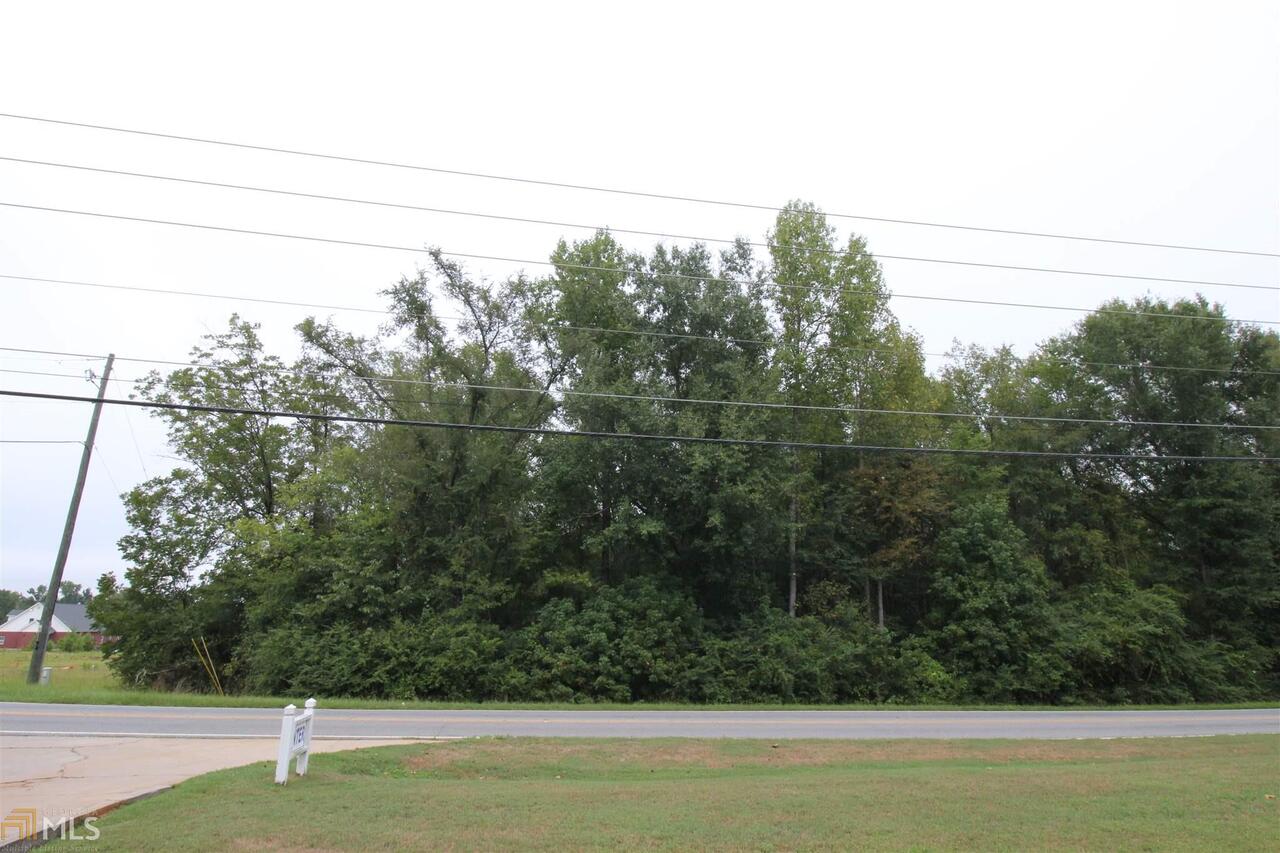675 Dunlap Road Northeast Milledgeville, GA 31061 - Photo 2 of 7 a view of a yard with an outdoor space