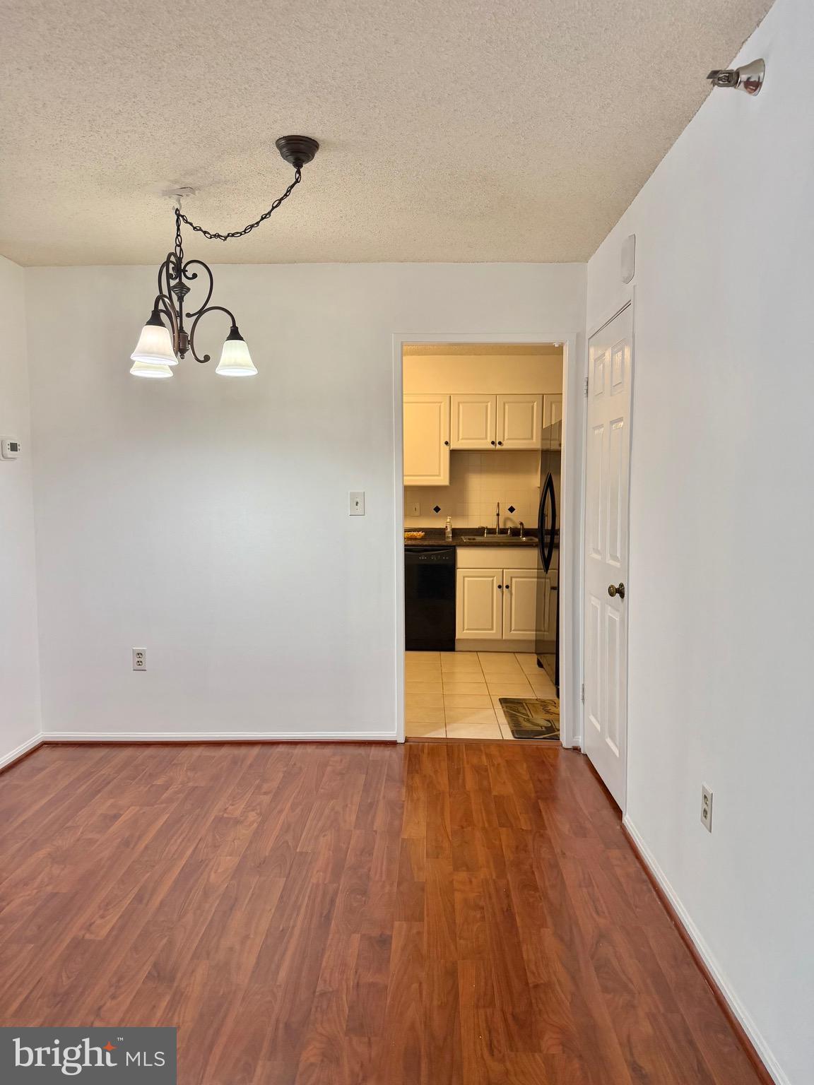 15107 Interlachen Drive, Unit 2119 Silver Spring, MD 20906 - Photo 4 of 27 Living Room Dining Area