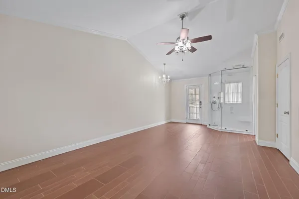 a kitchen with kitchen island a sink stove and refrigerator