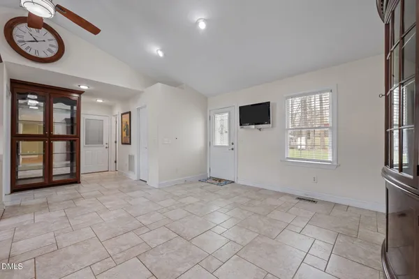 a spacious bathroom with a shower and a bathtub