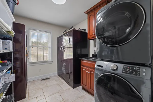 a kitchen with stainless steel appliances granite countertop a stove and a sink