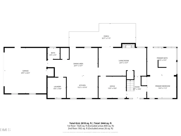 a front view of a house with a yard table and chairs