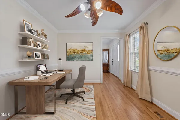 aerial view of a house with swimming pool and sitting area
