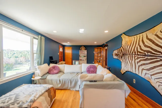 a view of kitchen with wooden floor and outdoor space