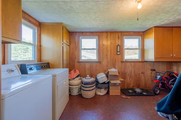 a bedroom with a bed and a closet