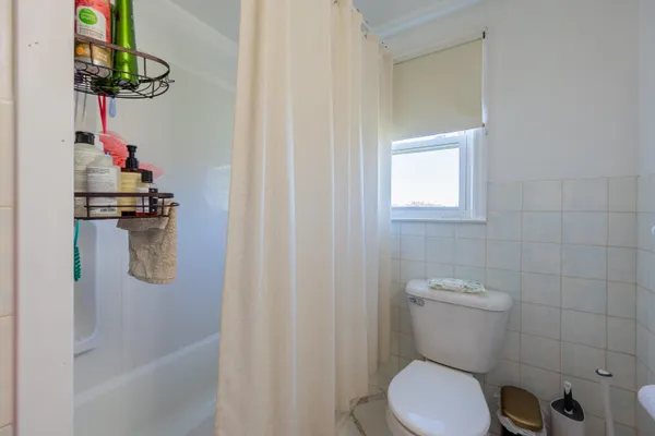 a view of a house with a yard and garage