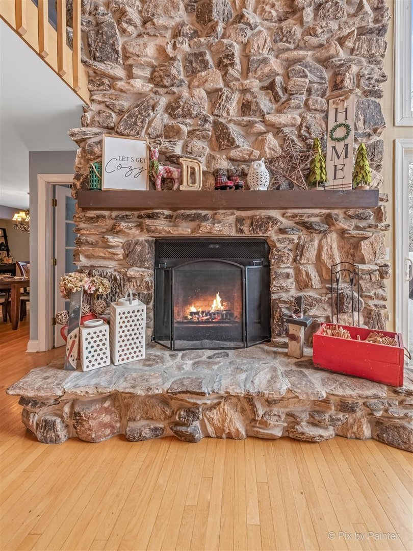 6914 Red Barn Road Crystal Lake, IL 60012 - Photo 20 of 63 a view of fireplace and wooden floor