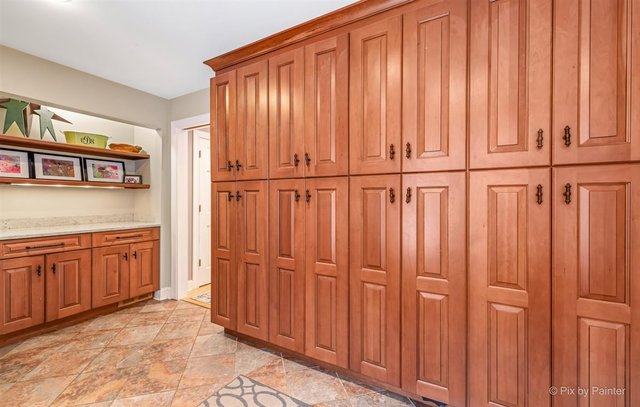 6914 Red Barn Road Crystal Lake, IL 60012 - Photo 33 of 63 a view of a kitchen with furniture and staircase