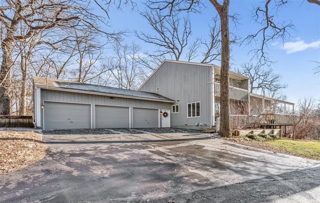 6914 Red Barn Road Crystal Lake, IL 60012 - Photo 53 of 63 a front view of a house with a yard