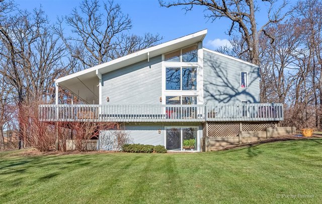 6914 Red Barn Road Crystal Lake, IL 60012 - Photo 57 of 63 a view of a house with a yard