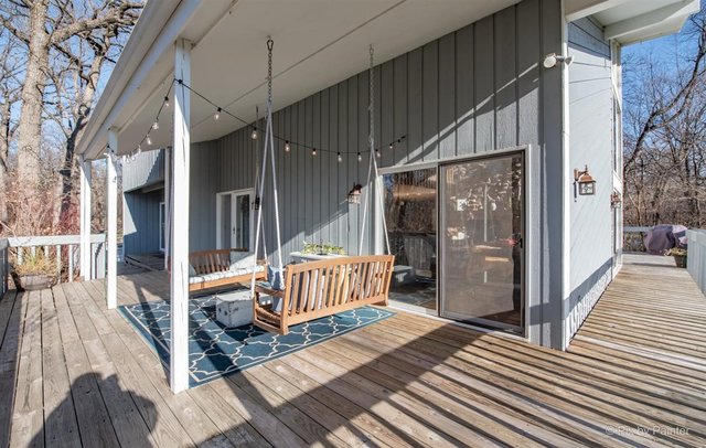 6914 Red Barn Road Crystal Lake, IL 60012 - Photo 59 of 63 a view of a balcony with wooden floor