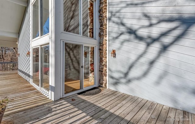 6914 Red Barn Road Crystal Lake, IL 60012 - Photo 61 of 63 a view of a balcony with wooden floor