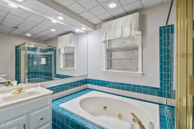a view of a porch with wooden floor and outdoor space