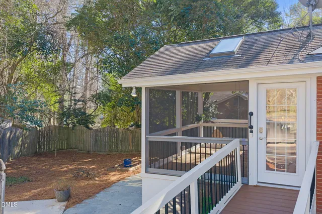 a view of a park with trees and grass