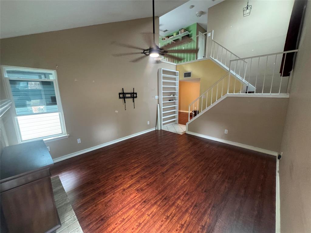 4649 Misty Ridge Drive Fort Worth, TX 76137 - Photo 19 of 25 a view of a hallway with wooden floor