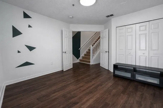 a close view of a utility room with dryer and washer