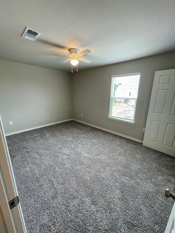 2740 Ginger Court Sherman, TX 75092 - Photo 2 of 16 an empty room with windows